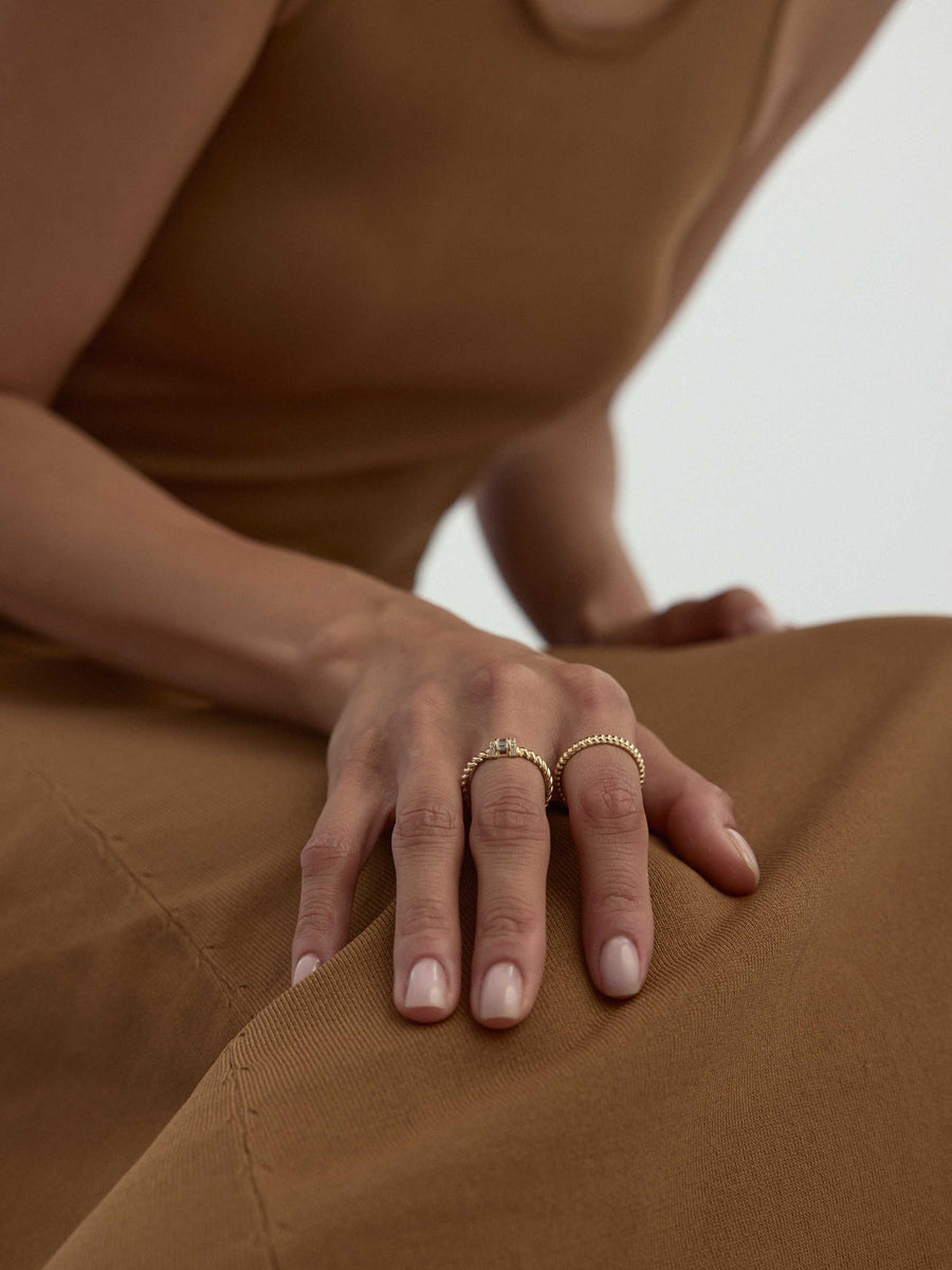 Baguette Stone Twisted Form Ring in 14K Gold