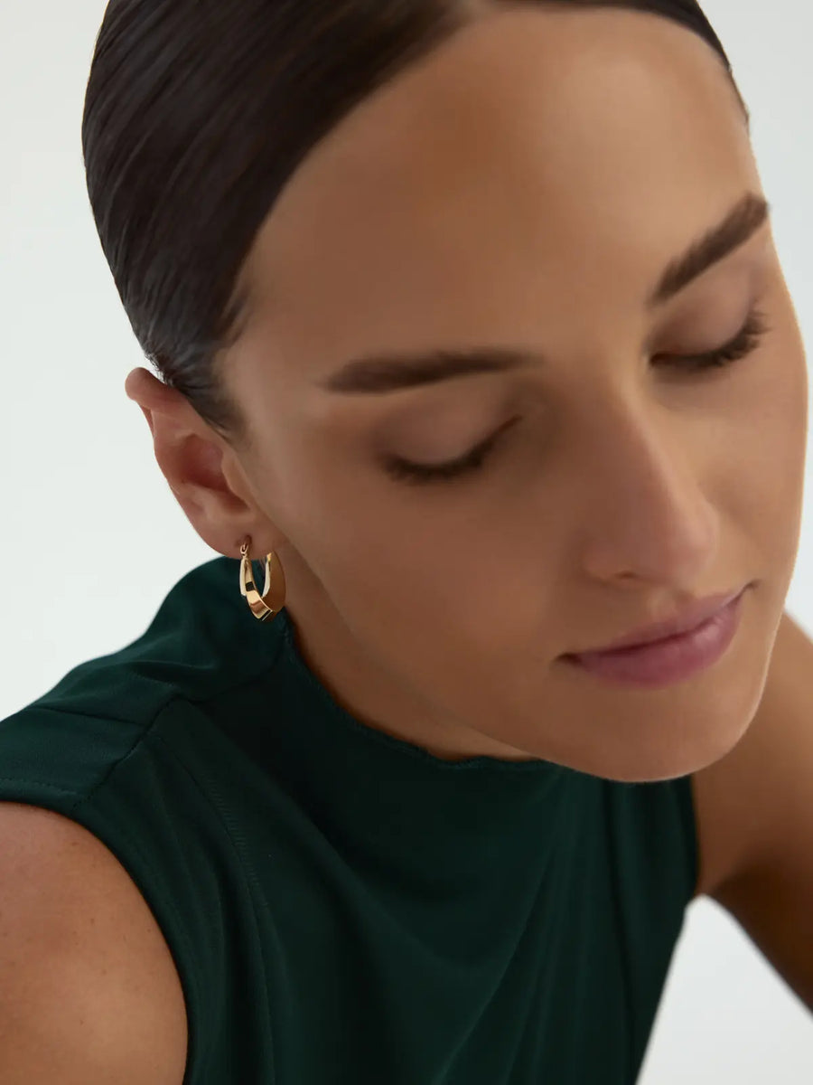 Domed Oval Form Hoop Earrings in 14K Gold