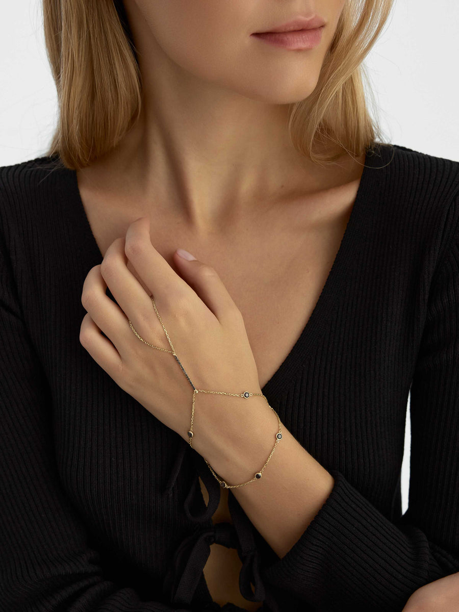 Double Chain Black Stone Accents Hand Chain in 14K Gold
