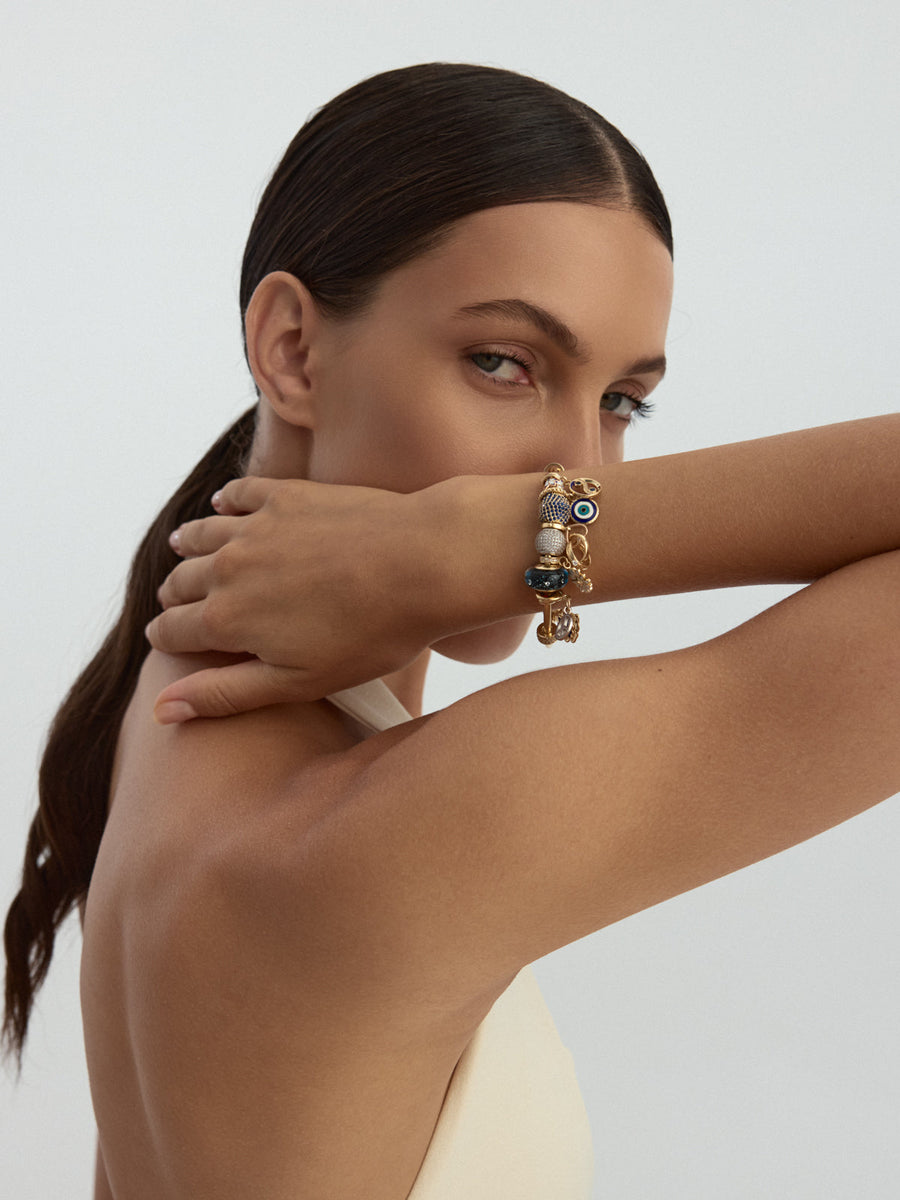 Blue Stone Infinity Form Charm in 14K Gold