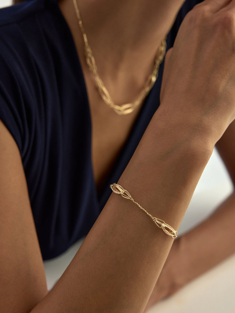 Braided Form Oval Ringed Bracelet in 14K Gold