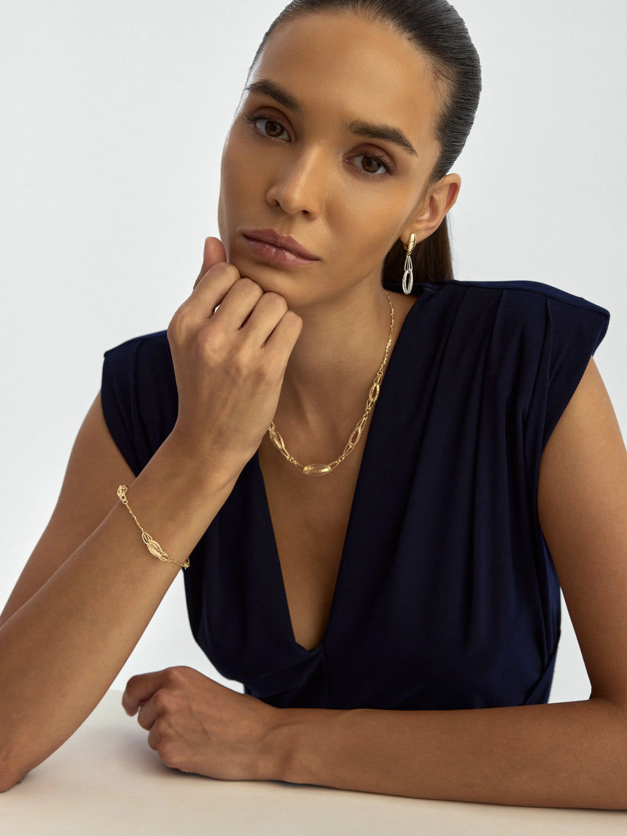 Braided Form Oval Ringed Bracelet in 14K Gold