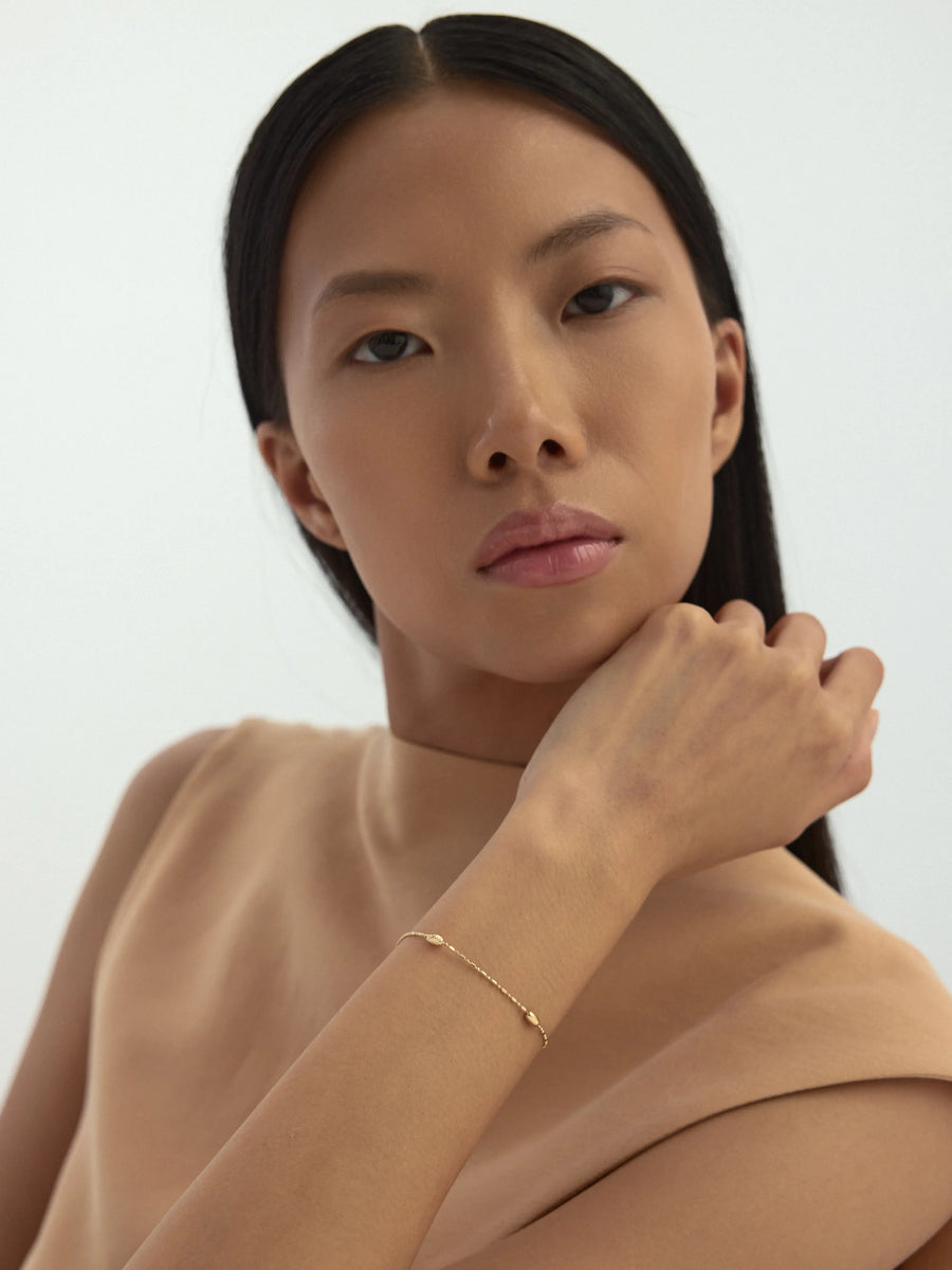 Oval Form Dorika Bead Bracelet in 14K Gold