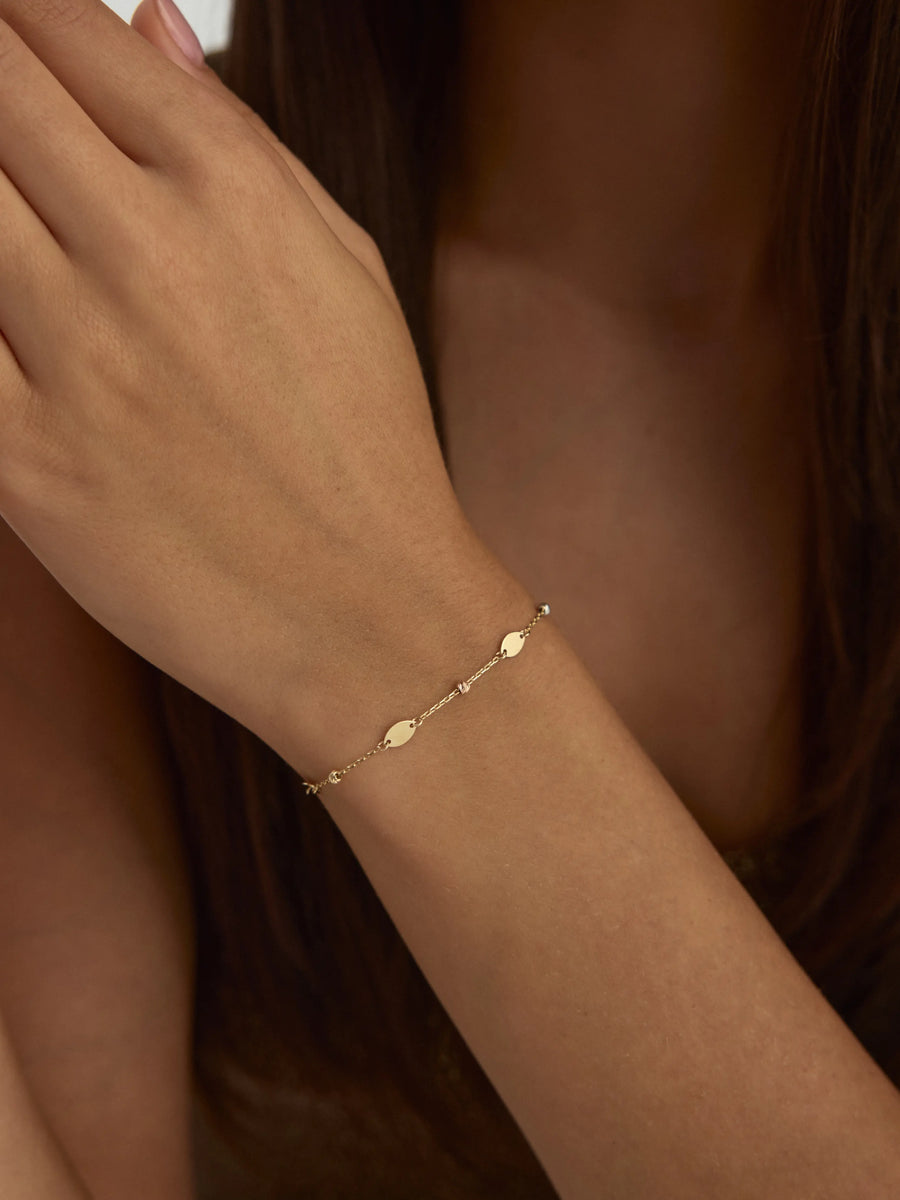 Oval Disc & Dorika Bead Bracelet in 14K Gold