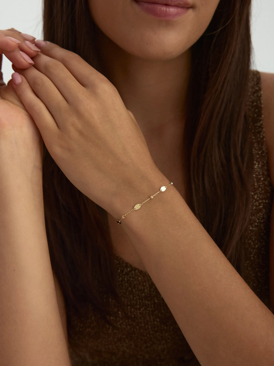 Oval Disc & Dorika Bead Bracelet in 14K Gold